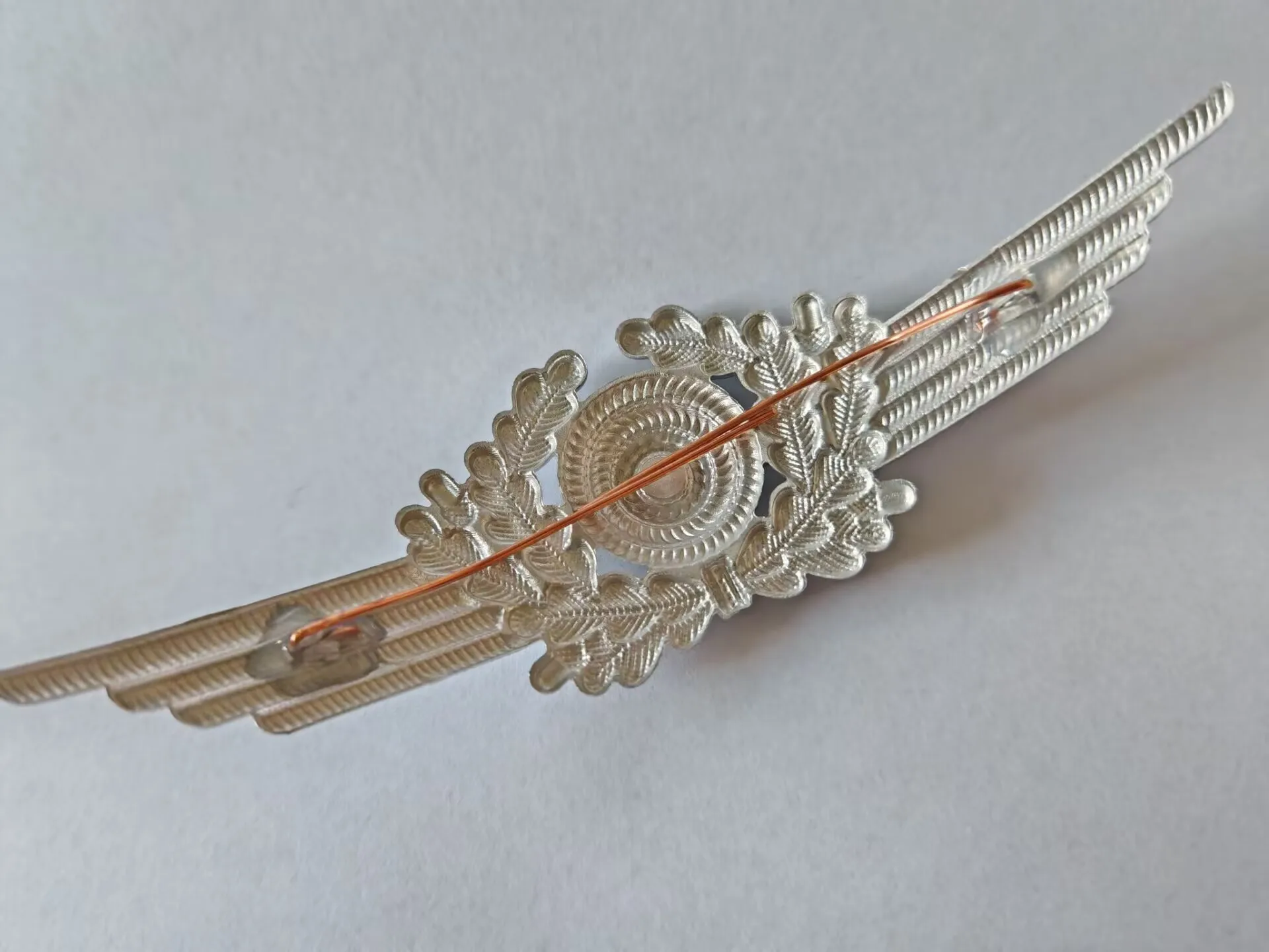 EMD LW Aluminum cap badge with an eagle