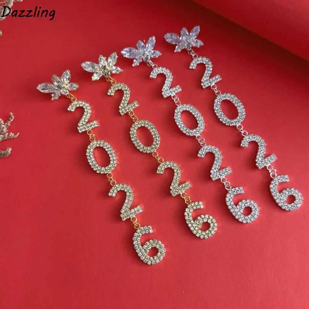 العصرية الجمالية 2026 وأقراط حجر الراين قطرة طويلة أقراط السنة الجديدة 2026 قلادة لامعة حجر الراين أقراط السنة الجديدة