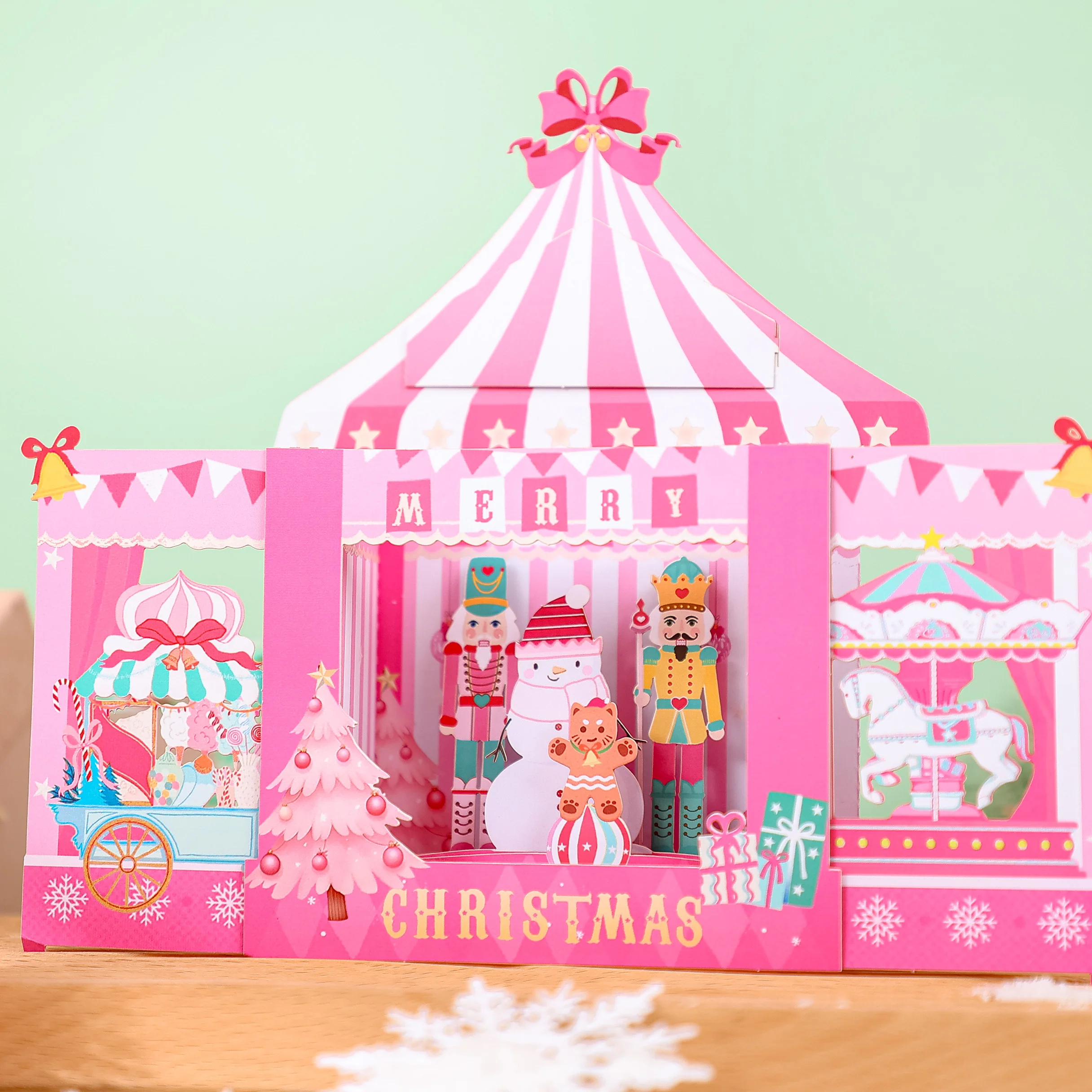 Weihnachts-Zirkus-Grußkarte mit rosa Themen, ideal für Feiertagsfeiern