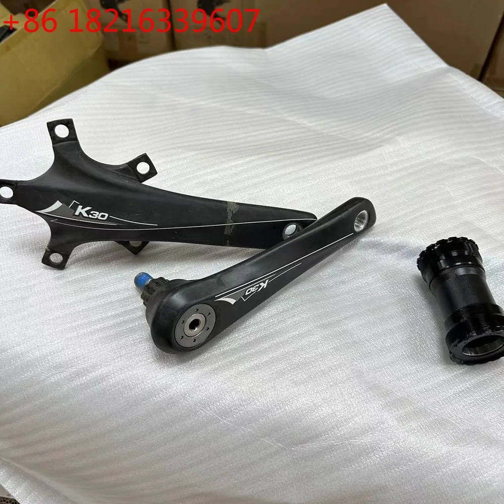 

Велосипедная система TAO Kuota LIGHT: Интегрированный карбоновый шатун и звездочка 50-34T для шоссейного велосипеда