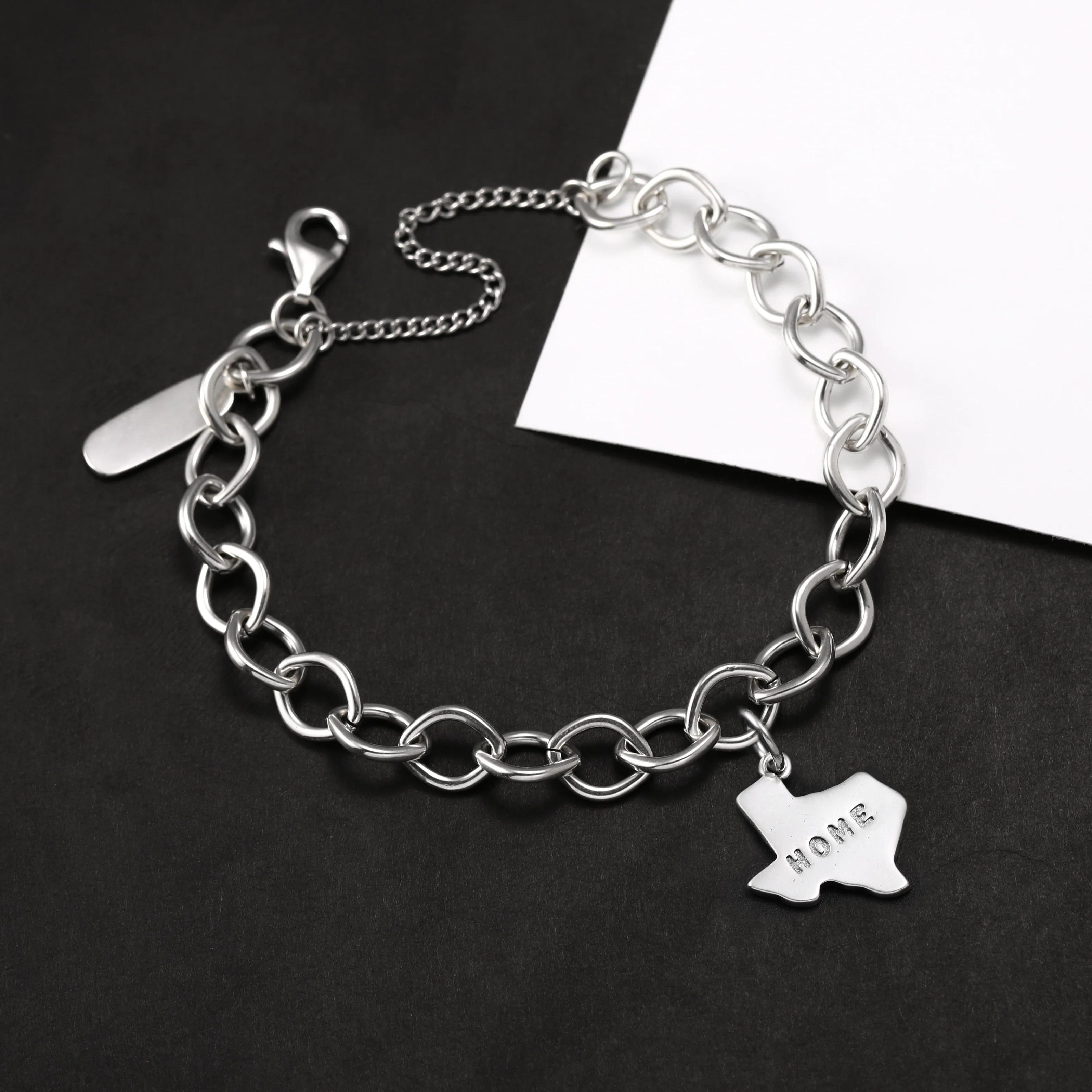 

Genuine 925 sterling silver Forged Link Charm Bracelet paired with the "Dezhou is my home" pendant