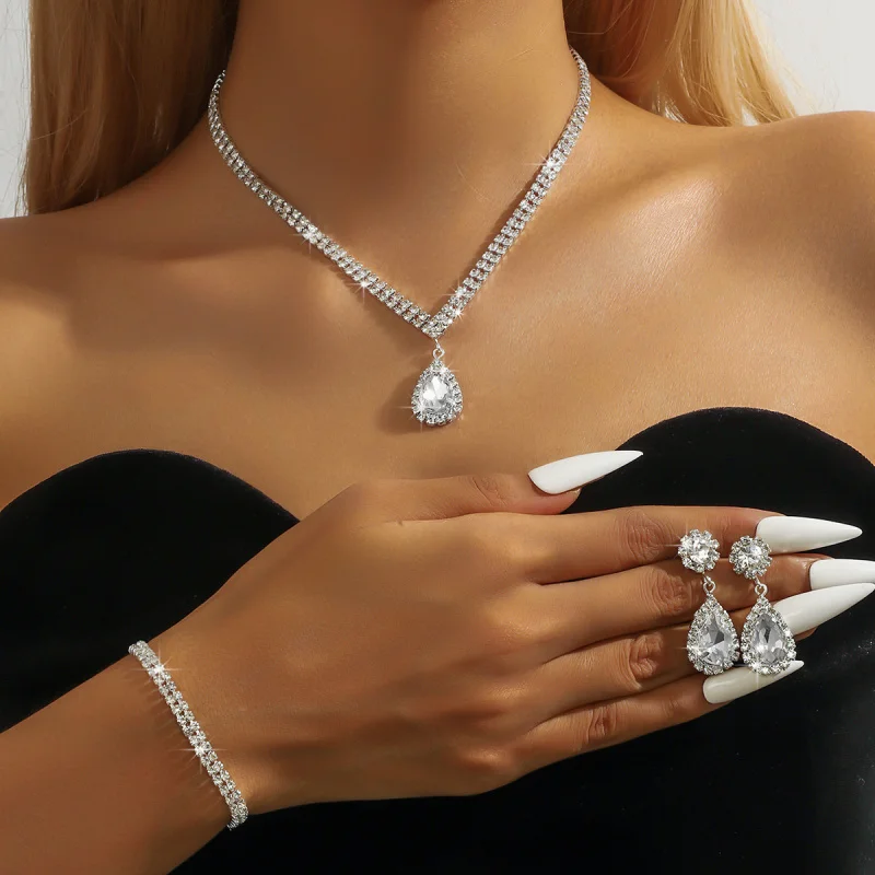 

E-commerce New Fashion Jewelry Wholesale Rhinestone Necklace Earrings Bracelet Ring Wedding Bride Jewelry Set Combination
