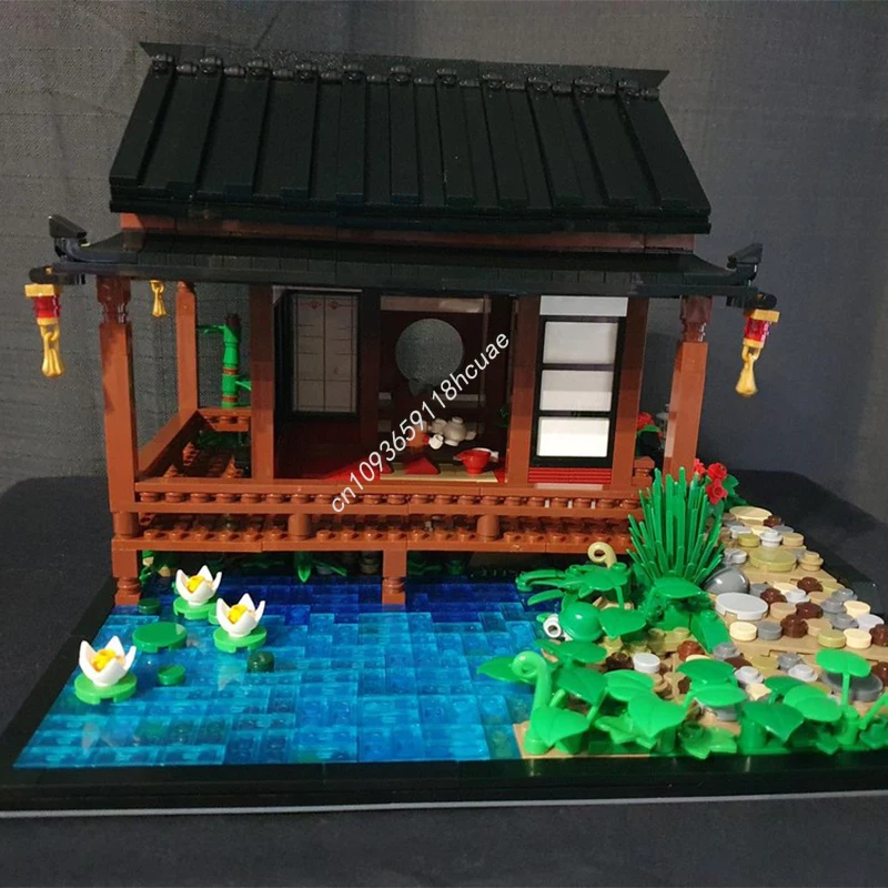 1354 ชิ้น ชุดตัวต่อ MOC ร้านน้ำชาญี่ปุ่นริมสระน้ำ บล็อกตัวต่อคริสต์มาส รุ่นพรีเมียม สำหรับนักสะสม เหมาะสำหรับเป็นของขวัญให้แฟนคลับผู้ใหญ่