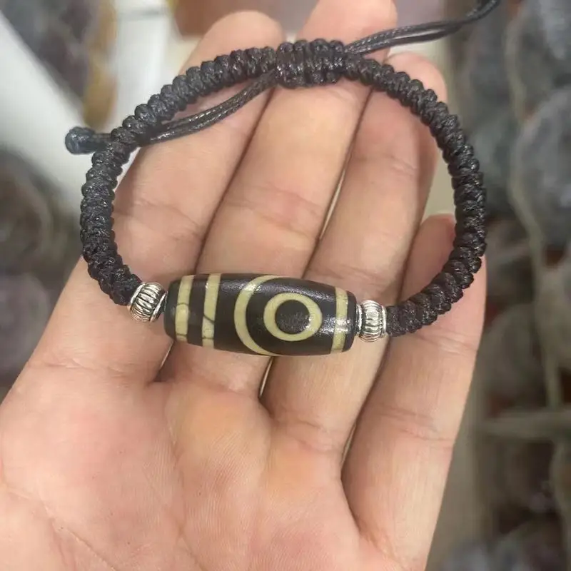 Vintage nine-eye Dzi bead bracelet, single-strand, featuring weathered agate and a treasure bottle design, Tibetan-style wealth