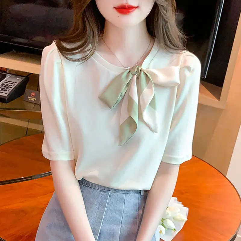 

Sweet O-Neck Spliced Lace Up Bow Blouses Female Clothing 2025 Summer New Loose Solid Color All-match Tops Korean Shirt