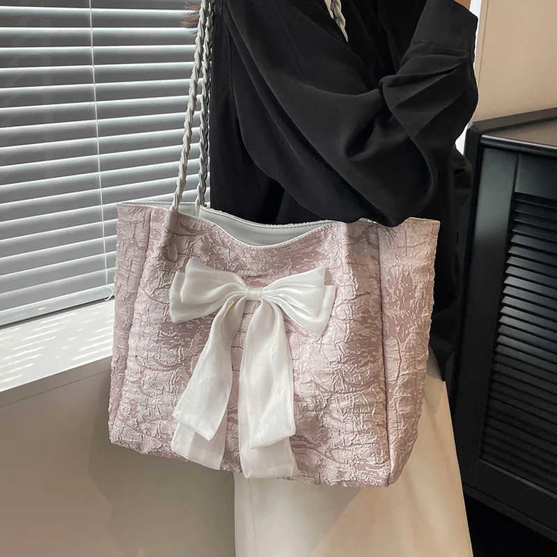 Легкая роскошная универсальная холщовая сумка большой вместимости на одно плечо, новинка 2025, модная сумка-тоут с бантом подмышками, женская пригородная сумка на плечо