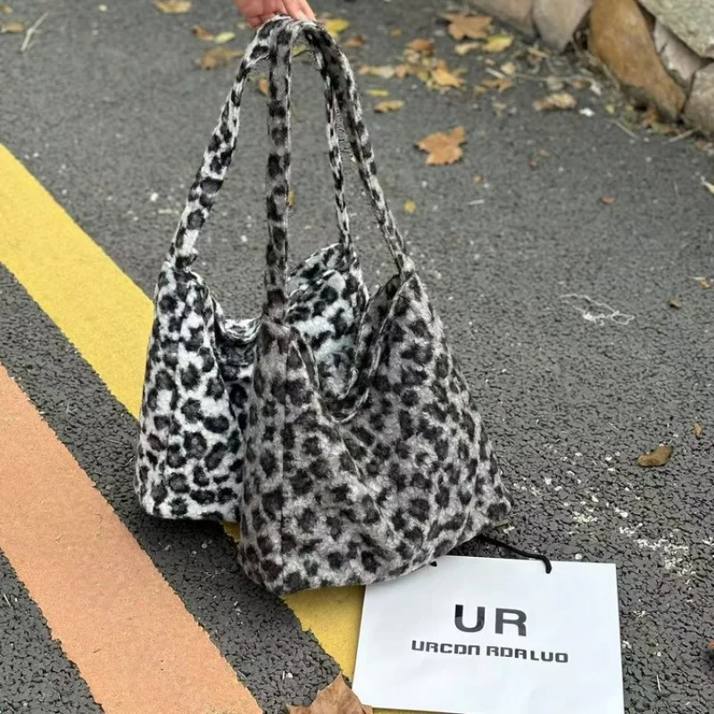 

Luxury Brand Inspired Women Handbag With Signature Pattern For Fashionable Outings And Events
