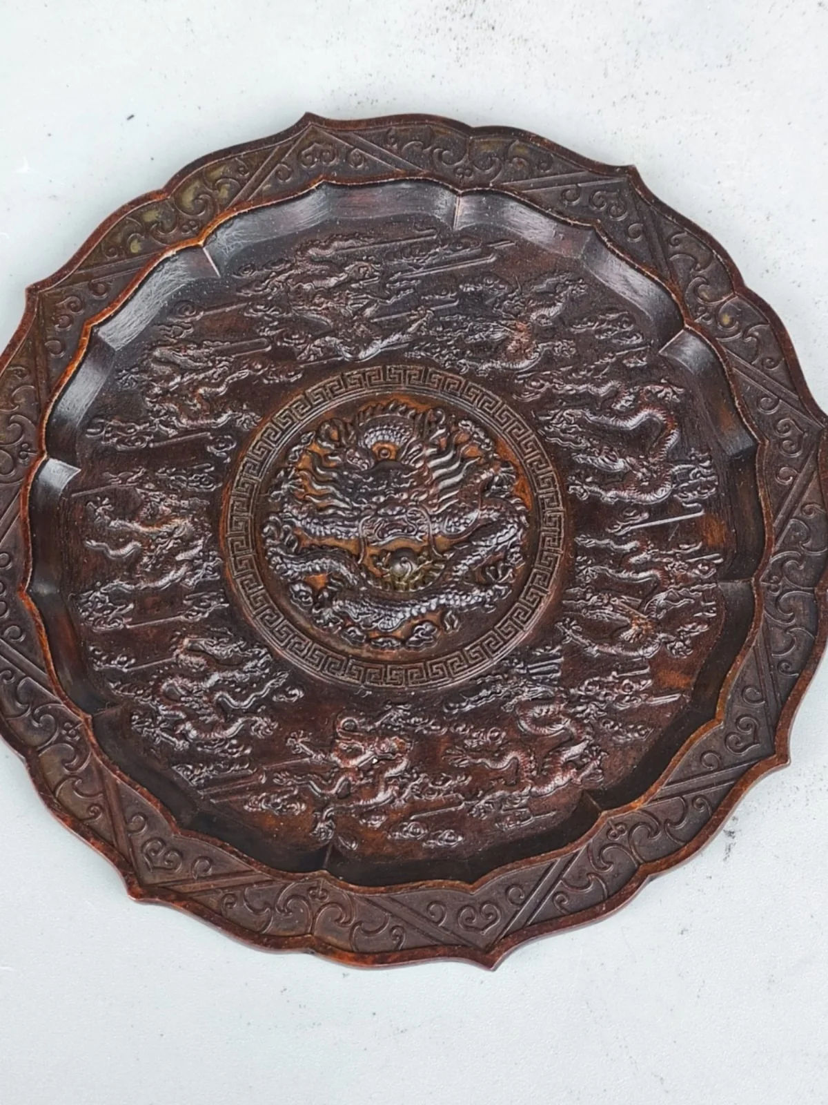 Antique bronze ware with nine dragon patterns on plate, exquisitely carved with relief, flower arrangement carving techniques