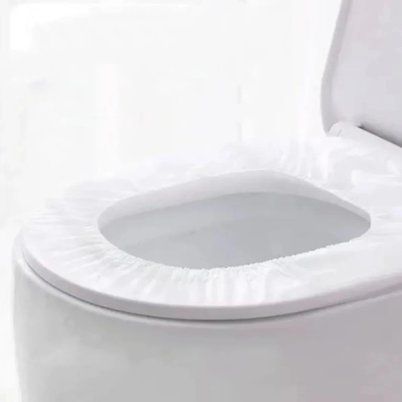 Bantalan kursi Toilet sekali pakai portabel grosir WC non-tenun katun Travel Hotel Rumah Tangga penutup Toilet paket tunggal tahan air