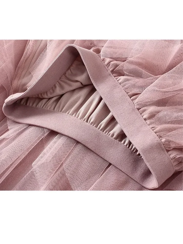 Spring 2024 Korean version elastic waist fashionable versatile slimming mesh splicing irregular mid length high waist skirt