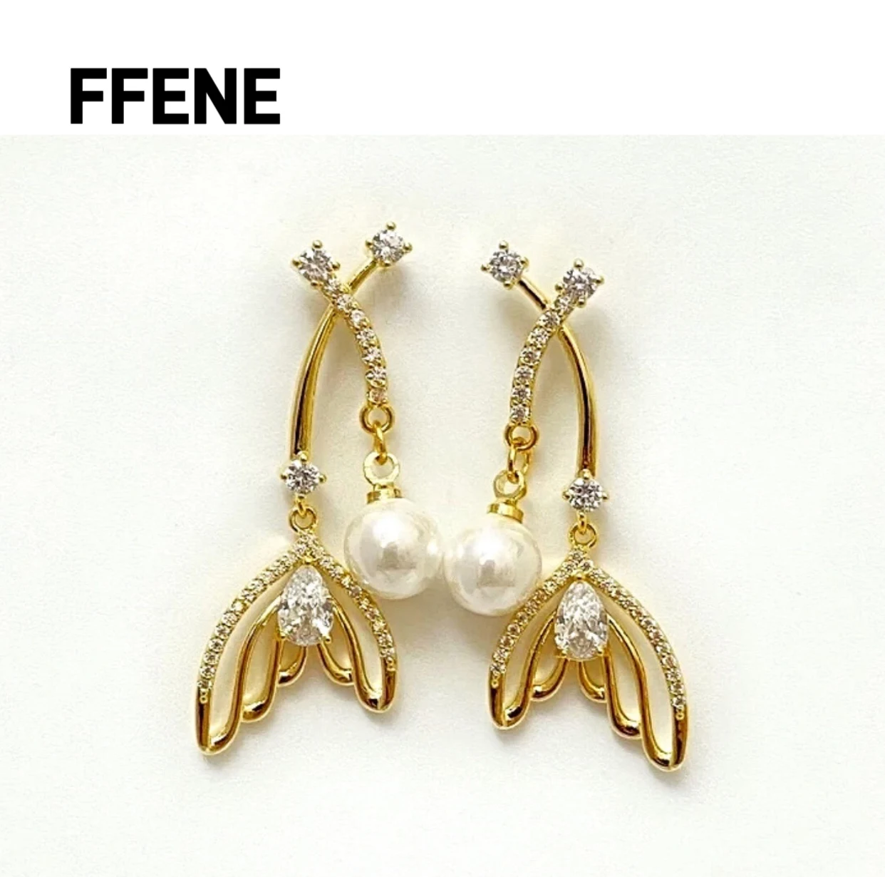 

Hot-selling fashion zircon fish tail tassel earrings, temperament commuting versatile earrings, high-end feeling internet