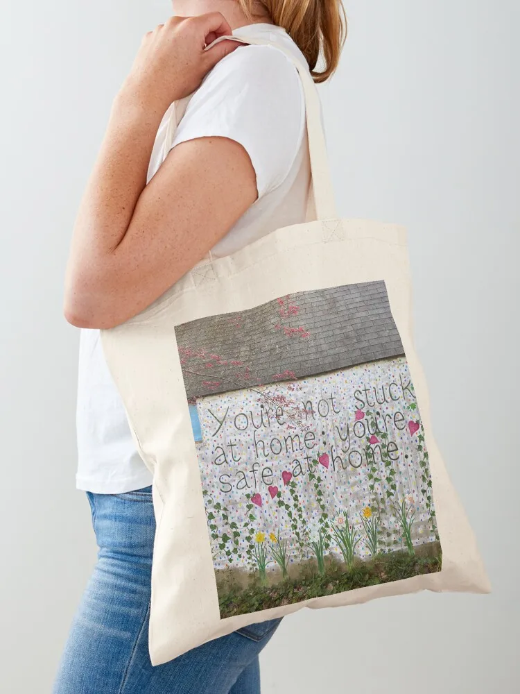 

You're not stuck at home; you're safe at home from a mural on concrete garage wall Tote Bag Women's shopper eco pack