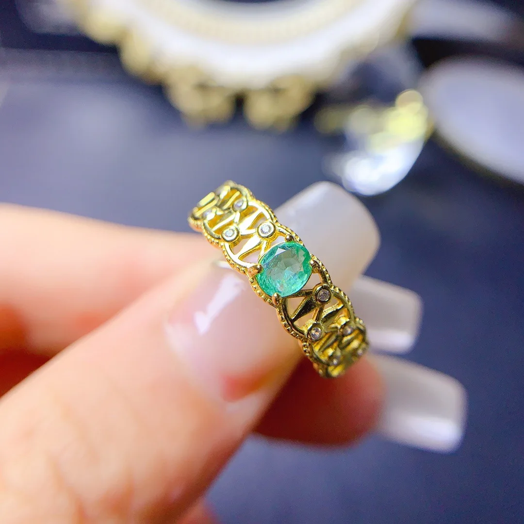 

Fashion Designed By A Designer Ring Featuring A Genuine Emerald in Premium S925 Silver Statement of Jewelry