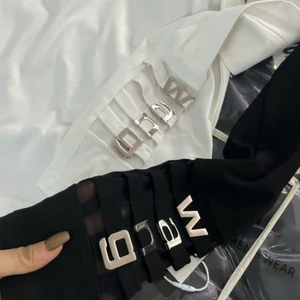 Der Wattestäbebrief der Frauen, ein hohes elastisches T-Shirt, lange Ärmel, Schwarz und Weiß, Y2K-Kleidung, Sommer, 2022 12 Hauptverkäufe des Krupped White Gloss - №7