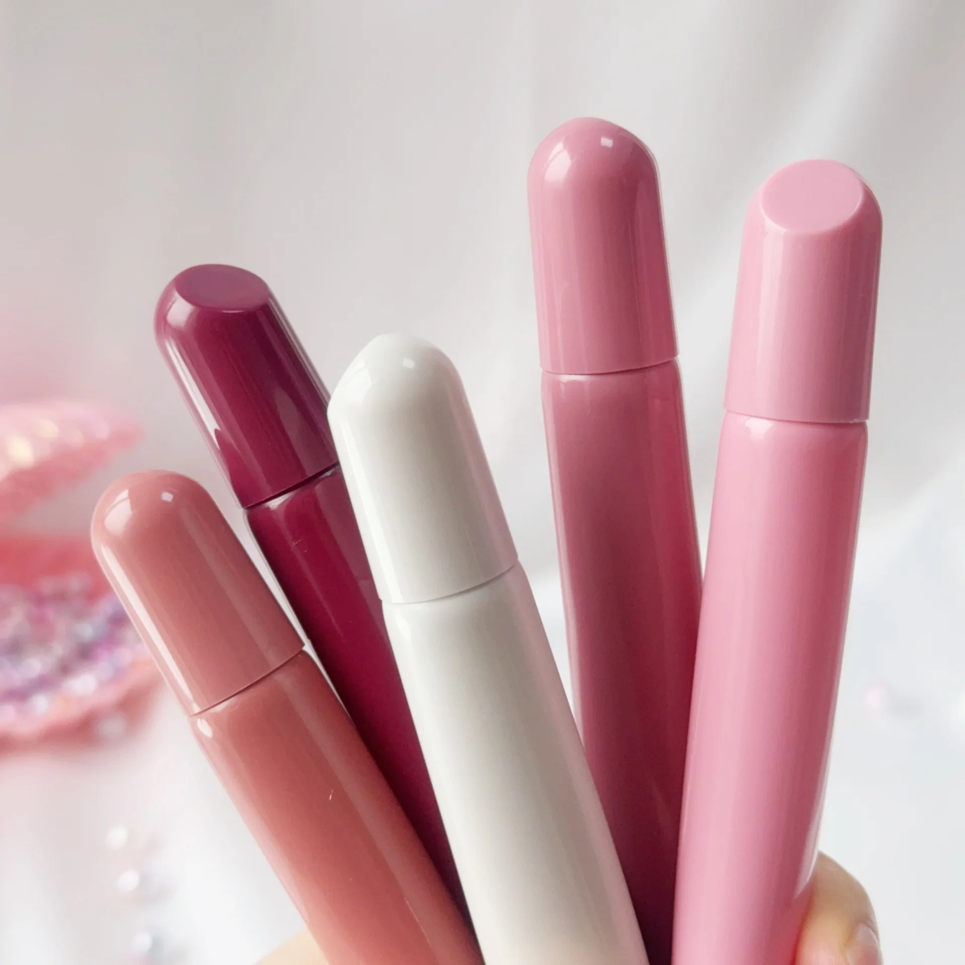 Tubos de aperto de brilho labial de massagem vazio recipiente de cosméticos lipgloss creme para os olhos garrafa recarregável rosa tubo macio logotipo personalizado 10ml