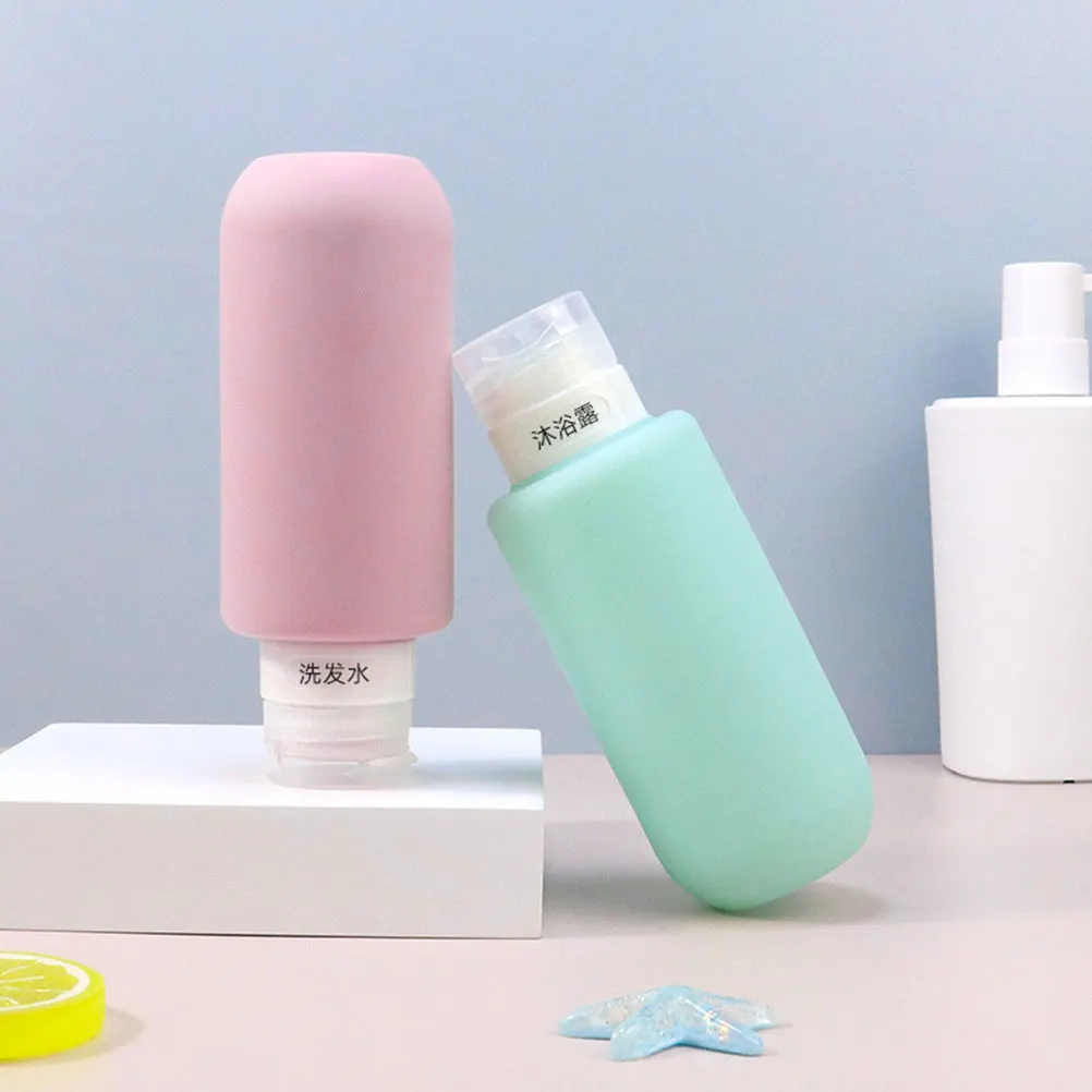 

2Pcs Mini Silicone Travel Containers for Shampoo Conditioner Portable Lotion Bottles Leak Proof Toiletry Storage Household Empty