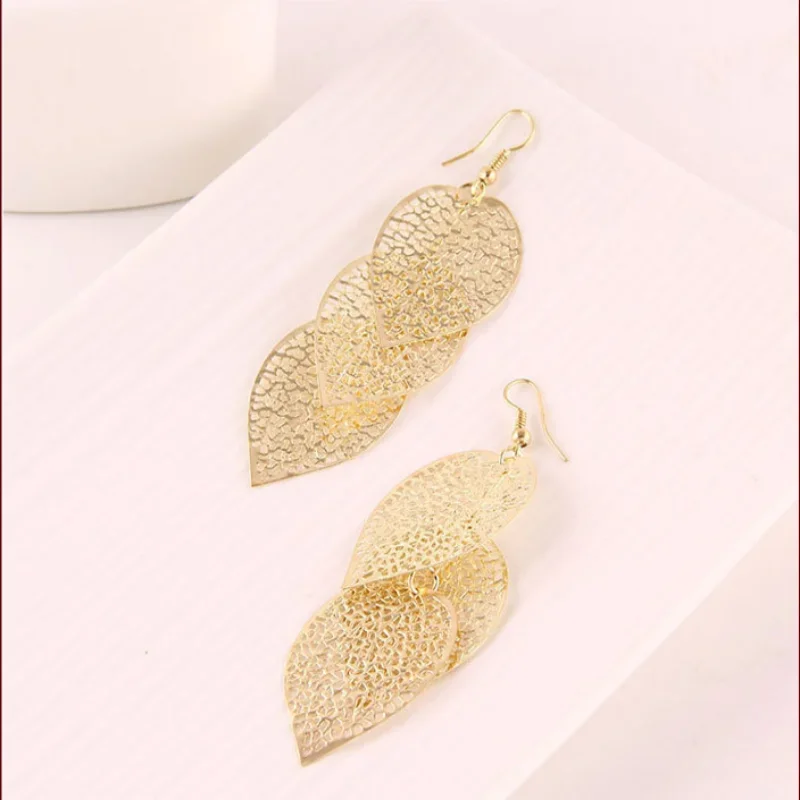 Delysia King   European and American fashion hollow metal leaf earrings