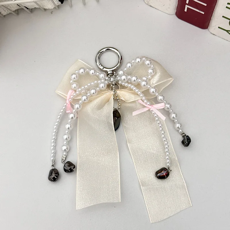 Catena per telefono con fiocco in garza morbida di perle di alta qualità Fascino per borsa per auricolari con fiocco in pizzo stile dolce e fresco nero e rosa