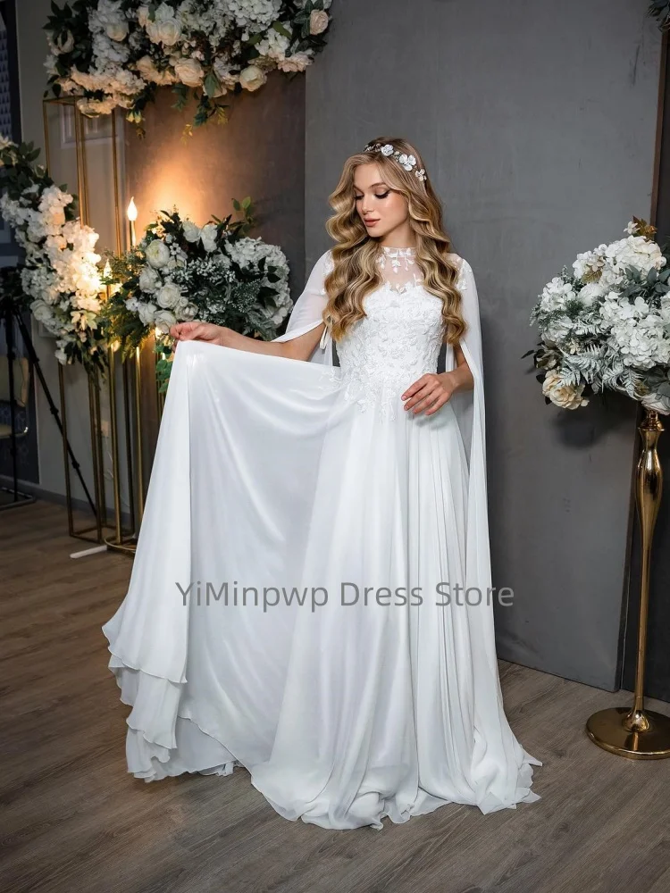 Eleganckie suknie ślubne z długimi, zwiewnymi rękawami, z wysokim dekoltem, zdobione aplikacjami i cekinami, szyte na miarę suknie ślubne z szyfonu, suknia ślubna robe de mariée