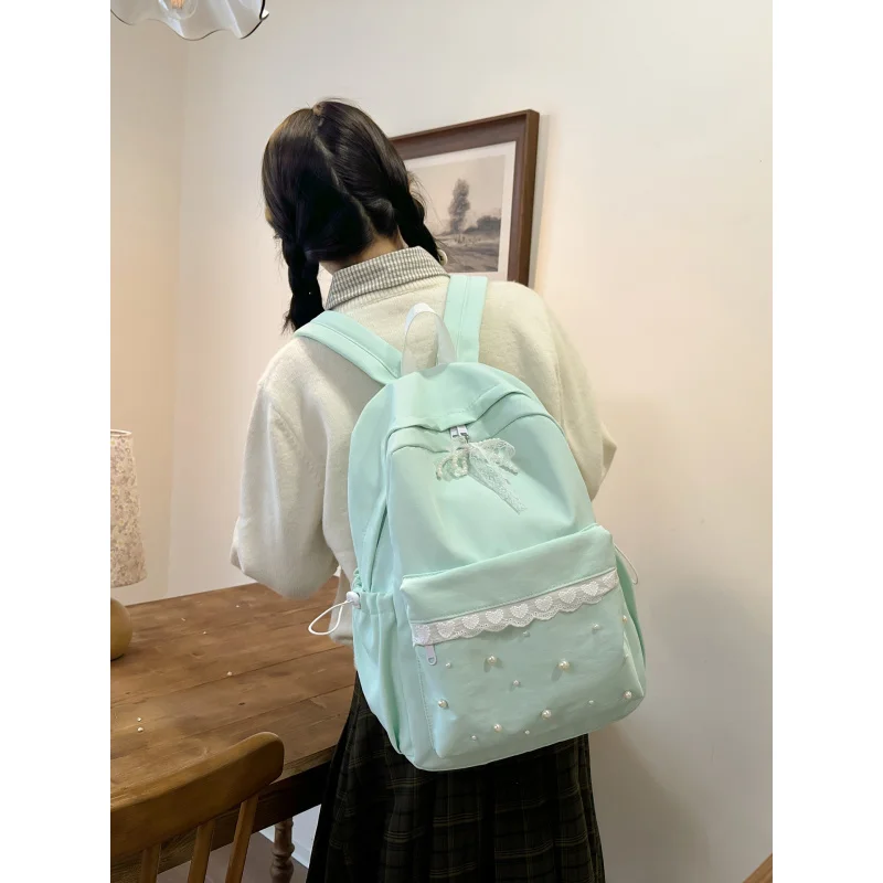 Sweet girly lace and pearl backpack for junior high and high school students, female student schoolbag, large capacity lightweig