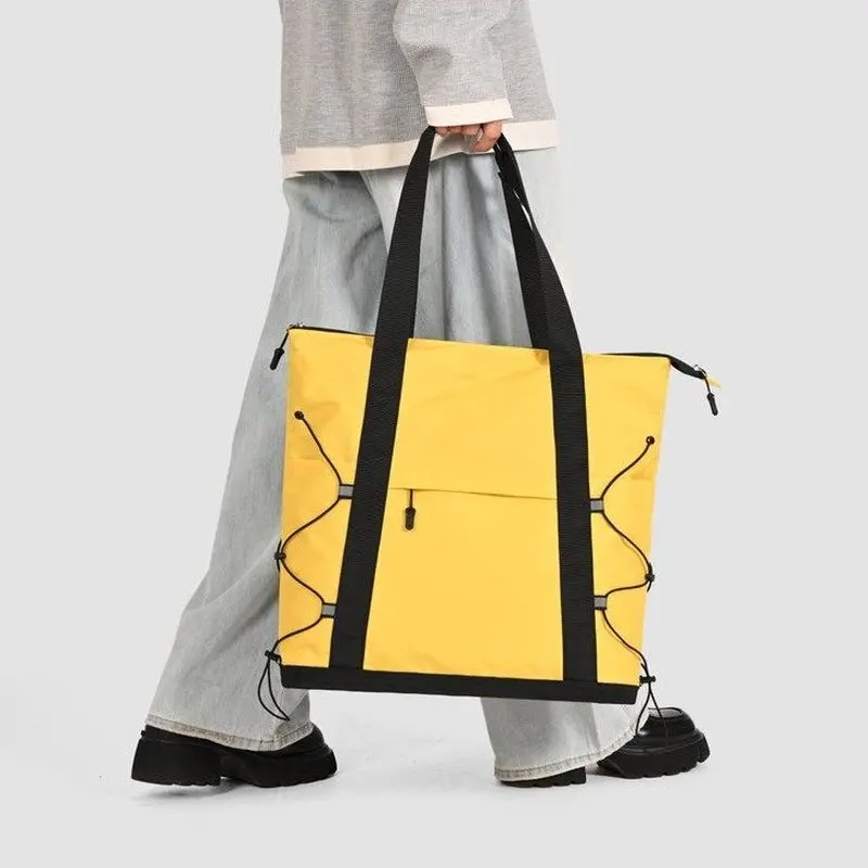 Yellow Black Tote Bag With Side Bungee Cords Large Capacity Waterproof Nylon Shoulder Bag For Travel Work Gym Daily Use