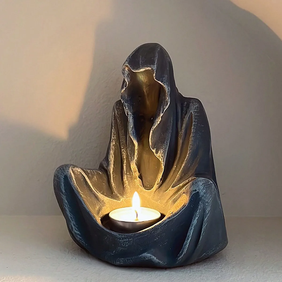 

Hooded Wizard Candle Holder‌ - Mysterious No-Face Statue for Gothic Home Decor