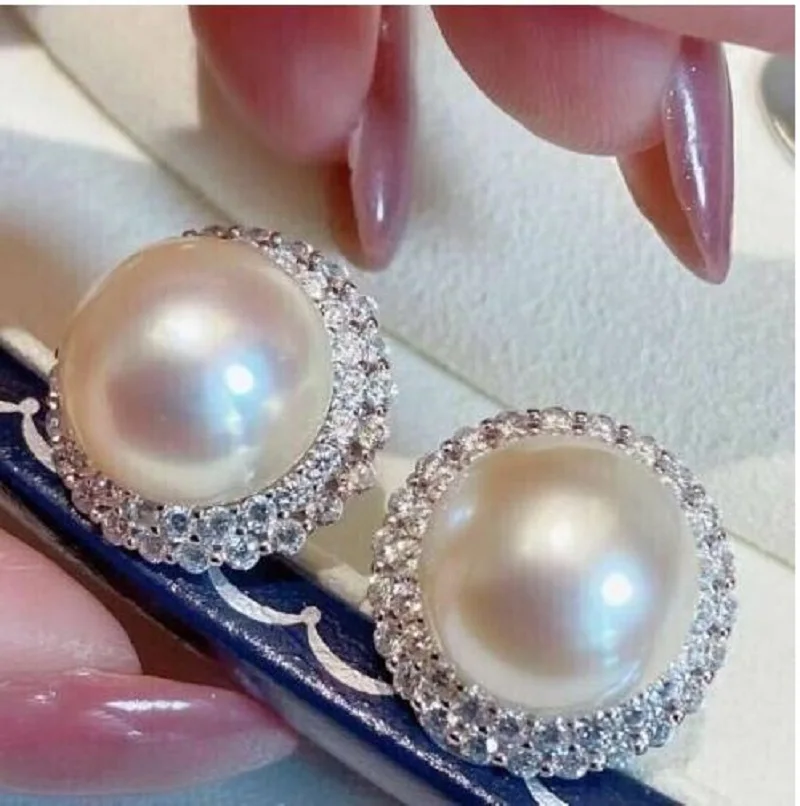 

Gorgeous Huge AAAA 12-13mm South Sea White Stud pearl earring 925s....