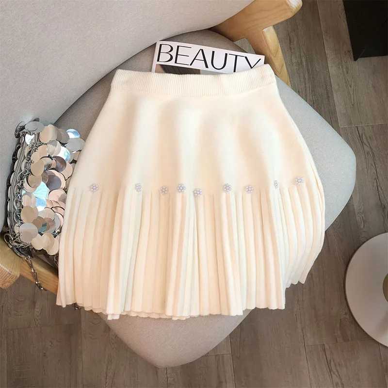 

Милая жемчужная мини-юбка с украшением в виде цветка, женские осенне-зимние плиссированные трикотажные юбки с высокой талией, женские корейские шикарные юбки трапециевидной формы