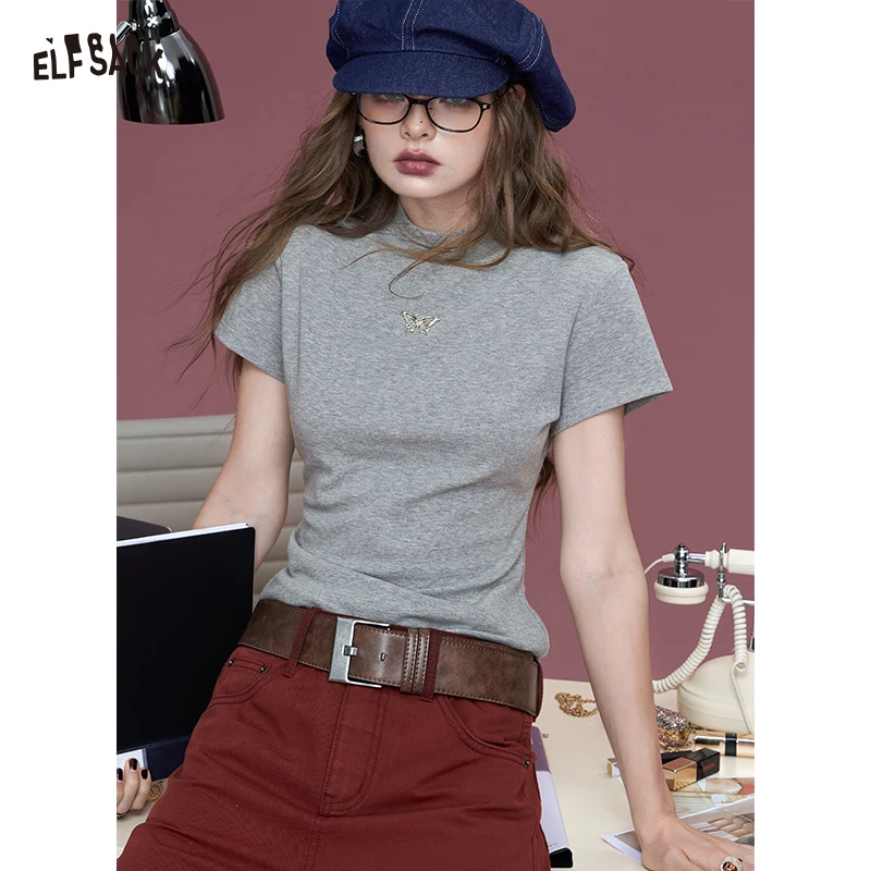 

ELFSACK Minimalist Grey Slim Fit T-Shirt with Silver Butterfly Pendant, Chic Mock Neck Short Sleeve Tee, Casual Aesthetic Top