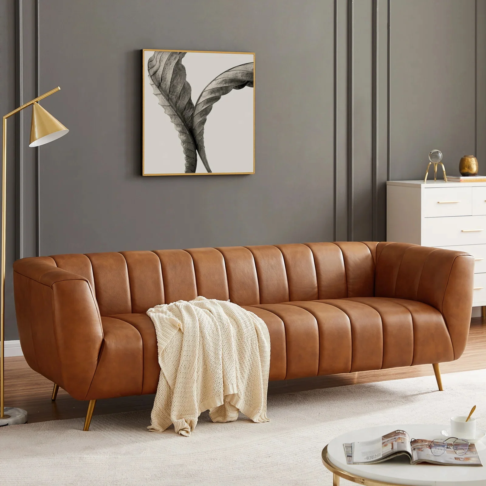

Nordic modern light luxury small apartment living room leather art sofa simple American three-person creative design studio