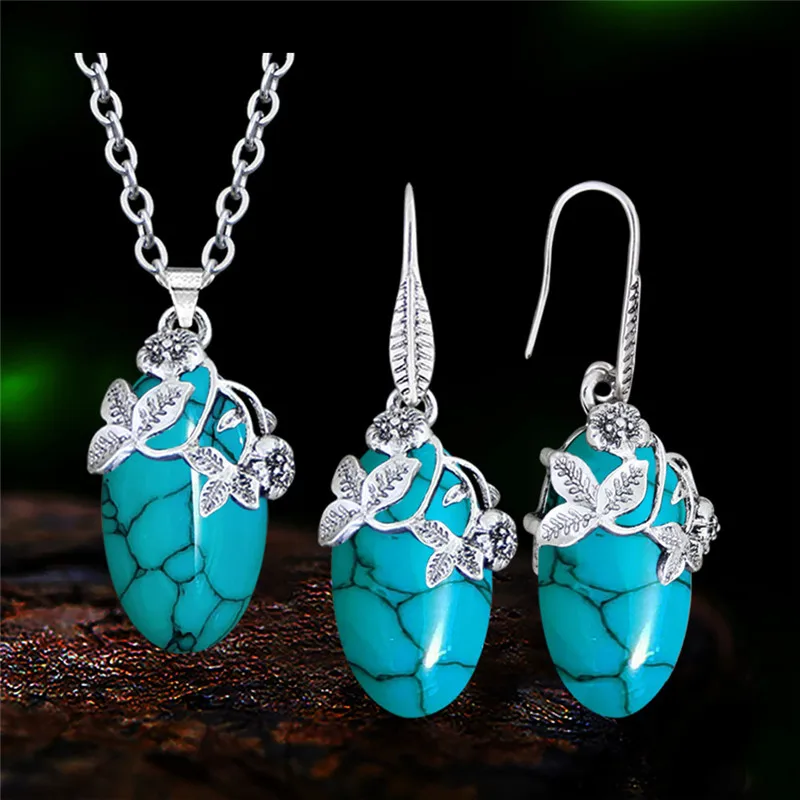 أطقم عقد وأقراط من الفيروز الصناعي للنساء ، مجوهرات عتيقة مطلية بالفضة ، شكل العين ، مظهر عتيق ، دلاية على شكل زهرة ، موضة