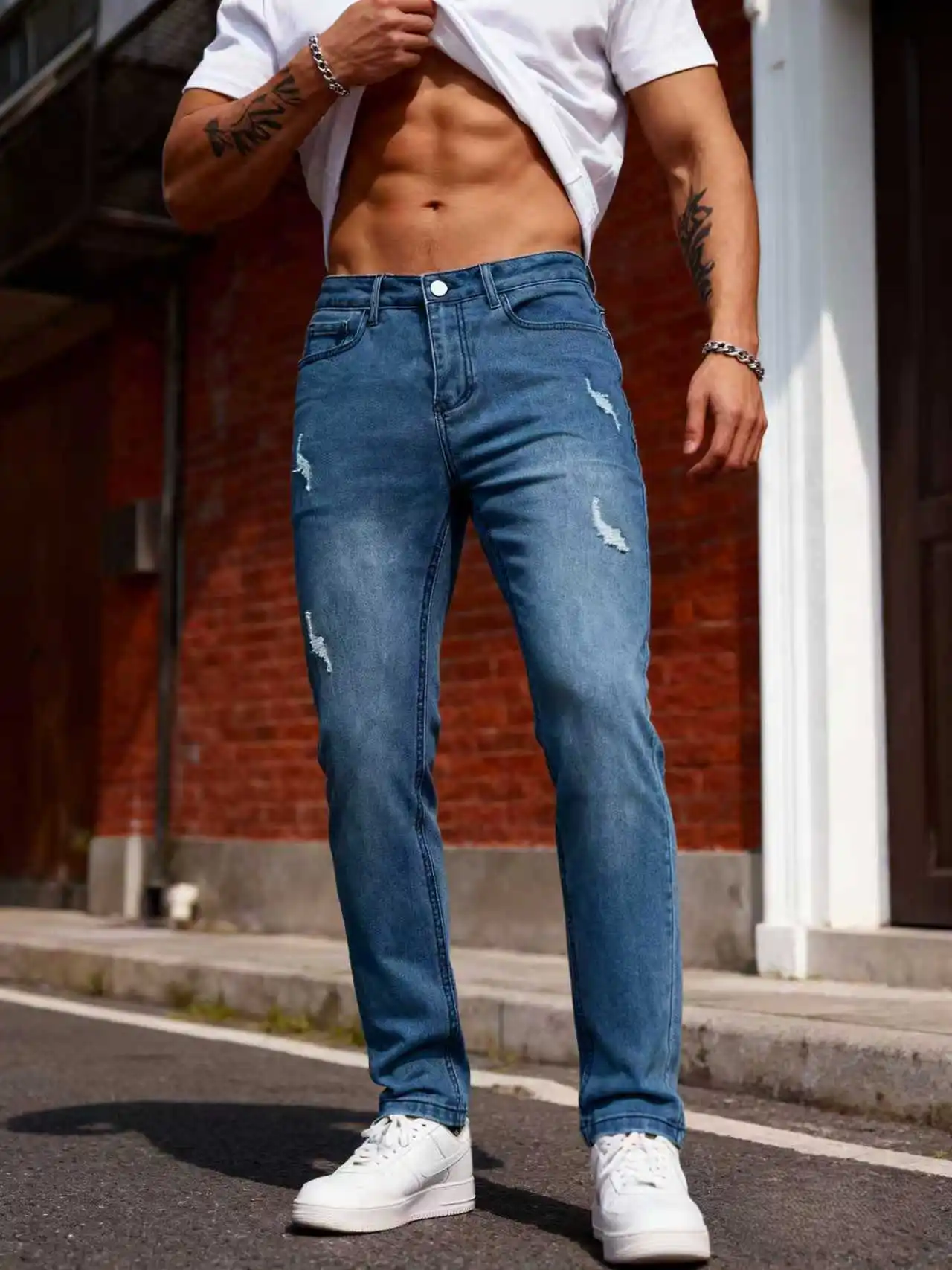 جينز ممزق عصري للرجال |   بنطال جينز مطاطي بقصة ضيقة باللون الأزرق الداكن، مثالي للعمل الذكي غير الرسمي والتواريخ والإجازات في عطلة نهاية الأسبوع