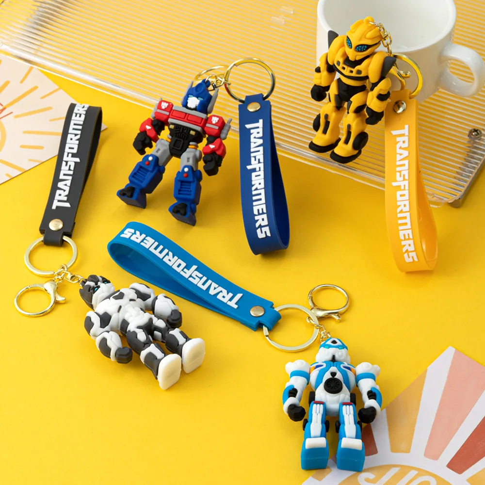 الكرتون فيلم محول مفتاح سلسلة أوبتيموس برايم نحلة روبوت سلسلة مفاتيح سيليكون سيارة مفتاح سلسلة حقيبة قلادة كيرينغ الأصدقاء