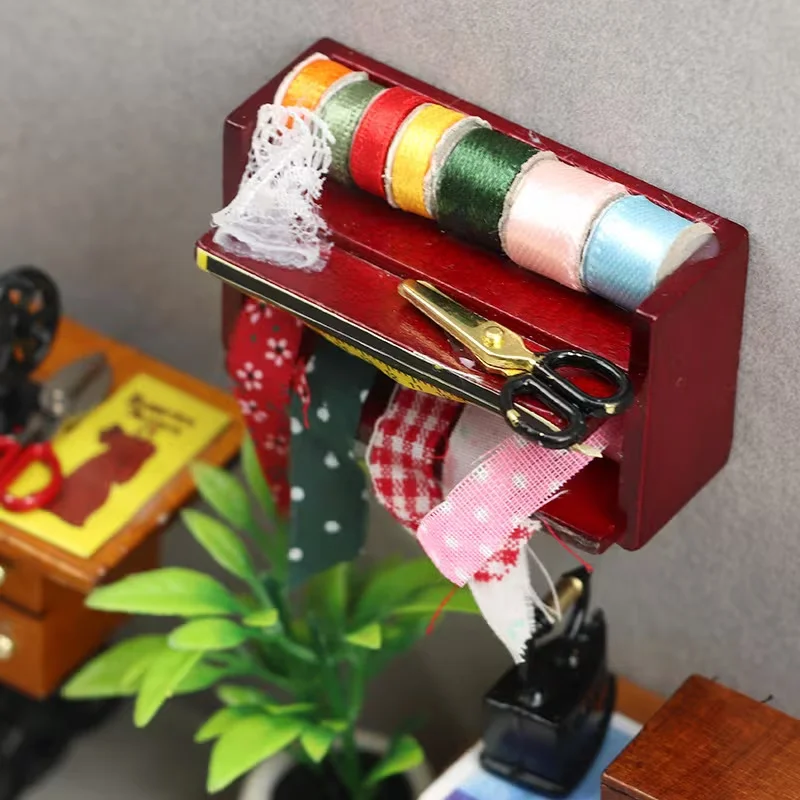 Dollhouse Mini Sewing Box with Lace Details. Ideal for Simulating a Sewing Scenario. With Some Colors Selected at Random.