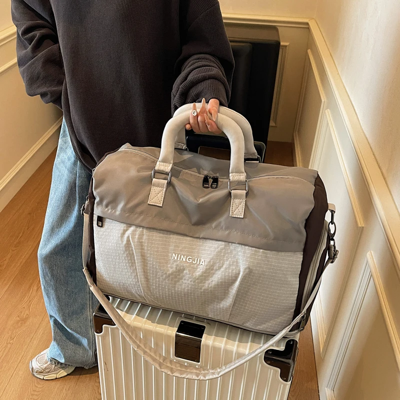 

New 2025 Lightweight Travel Bag for Men And Women ort Distance Busin Trip Handbag Durable Nylon Foldable Travel Bag