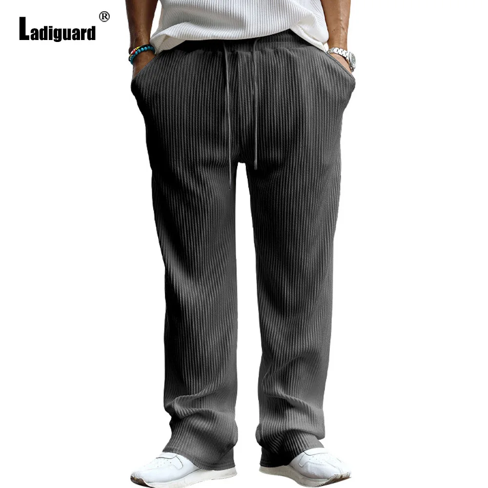 Pantalones rectos informales de talla grande para hombre, pantalones largos estilo América Europa, pantalones básicos suaves de color caqui y negro, pantalones de chándal para hombre nuevos