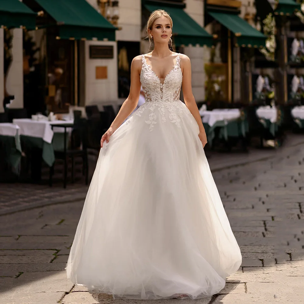 فساتين زفاف بوهيمية دانتيل مزين بالتول فساتين زفاف على شكل حرف V على شكل حرف a ثوب زفاف الوهم بدون ظهر فستان العروس حسب الطلب