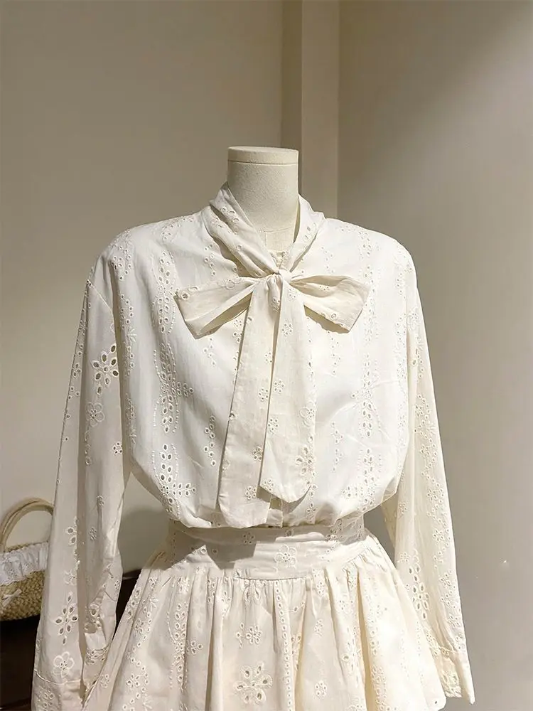 الخريف الفرنسية أنيقة 2 قطعة مجموعة المرأة الشريط الجوف خارج تصميم الرجعية القمم + Harajuku شيك تنورة صغيرة الإناث الكورية نمط الملابس