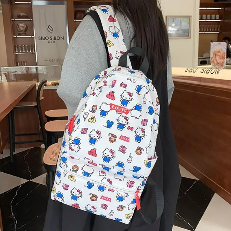 

Детский рюкзак Hello Kitty's Sanrios с героями мультфильмов для девочек, новая школьная сумка большой вместимости, нейлоновая водонепроницаемая аниме-фигурка Kawaii