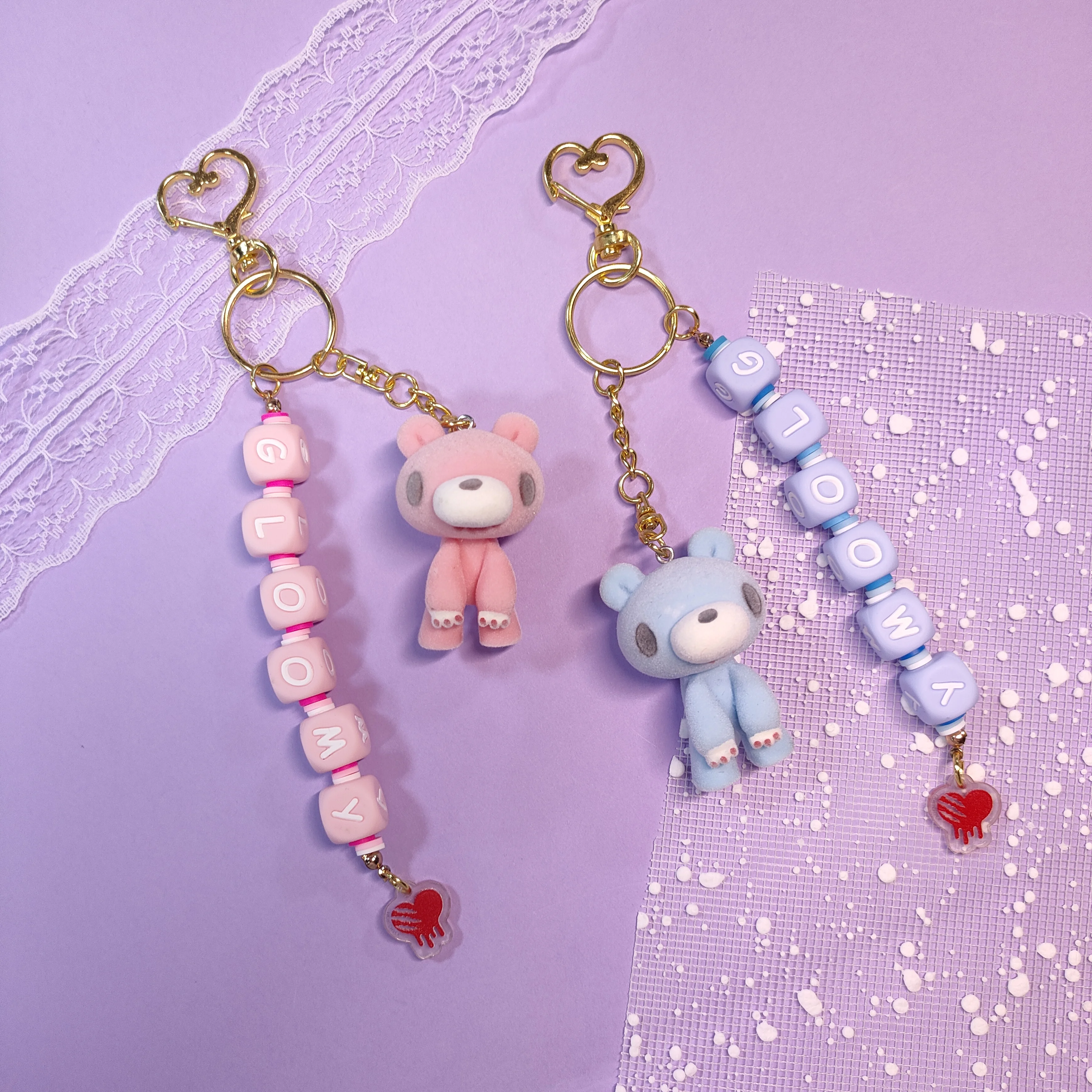 

Adorable bear keychains with "GLOWY" beads, heart pendants & fluffy texture. Perfect for keys/bags.