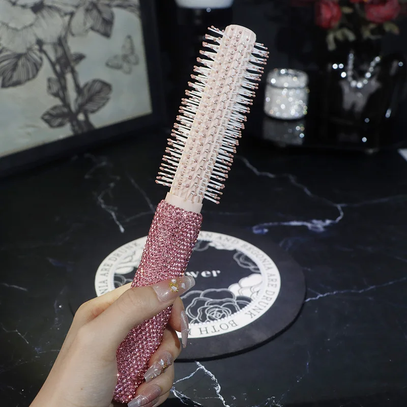 The water diamond-encrusted anti-static air cushion comb is fluffy, cute and has a high level of appearance