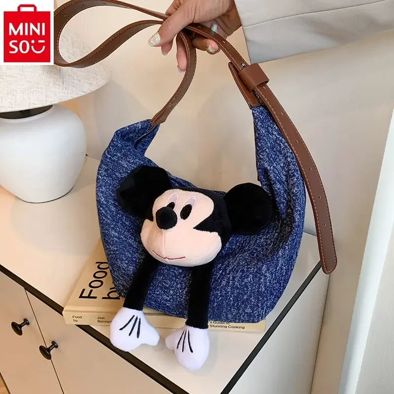 MINISO tas boneka Mickey koboi wanita, tas penyimpanan multifungsi tanduk ketiak klasik kualitas tinggi 2024