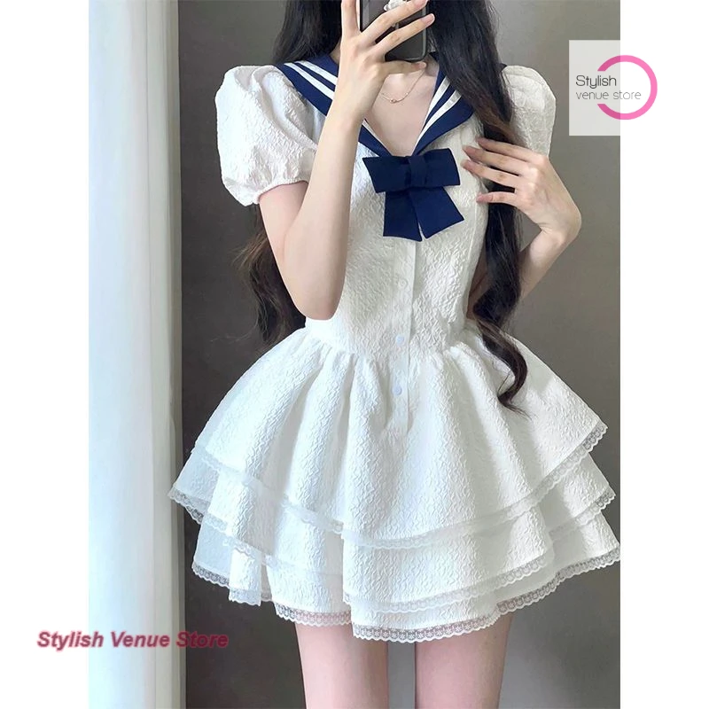 

Senior French white navy collar dress female summer new fashion temperament bow princess fluffy skirt waist short skirt.