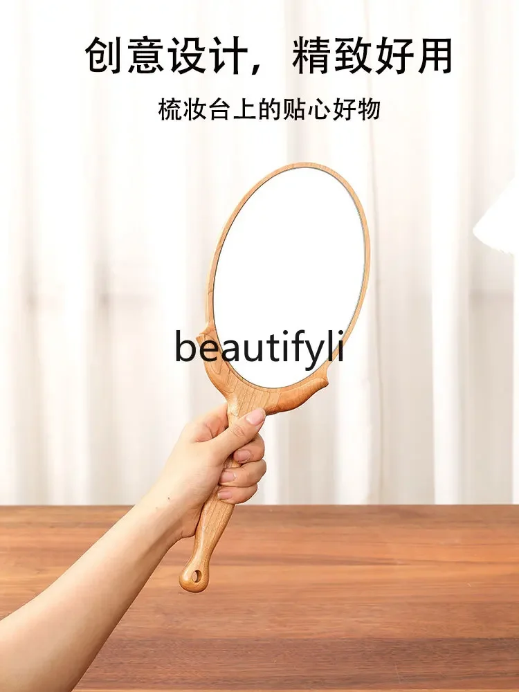 Handheld vanity mirror portable retro high definition French hand light luxury vanity mirror advanced