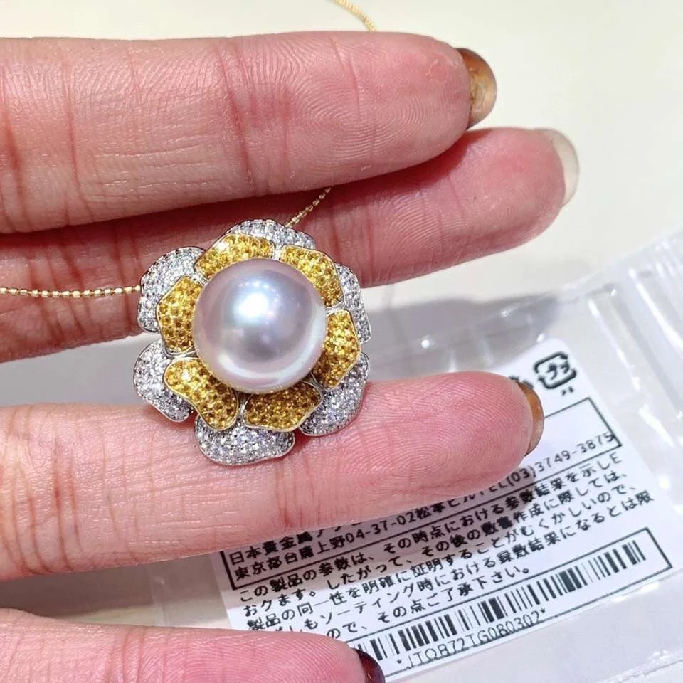 

Подвеска из сильного светлого натурального жемчуга 12-13 мм почти круглый почти безупречный пресноводный жемчуг из стерлингового серебра S925 (без цепочки)