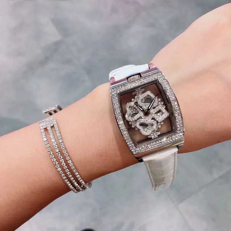 High Quality Luxury Quartz Watch with Rhinestone Spinning Diamond Face Fashion White Leather Tonneau Skeleton Watches for Women