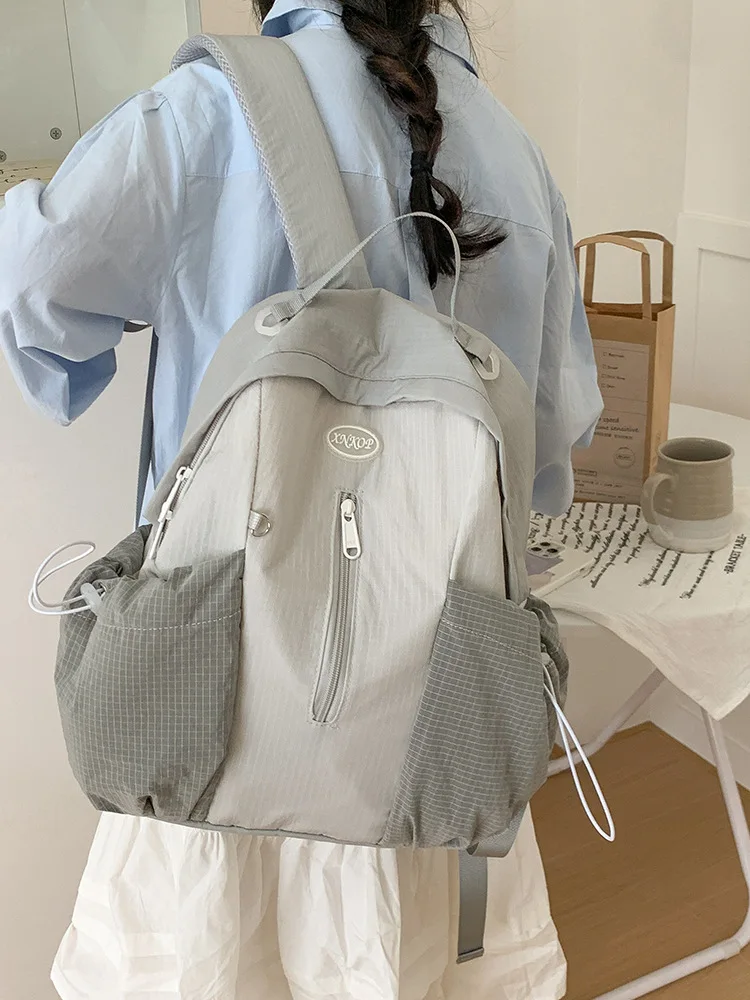 Highly stylish backpack for girls, junior high school students' burden-reducing school bag, plaid backpack for college students,
