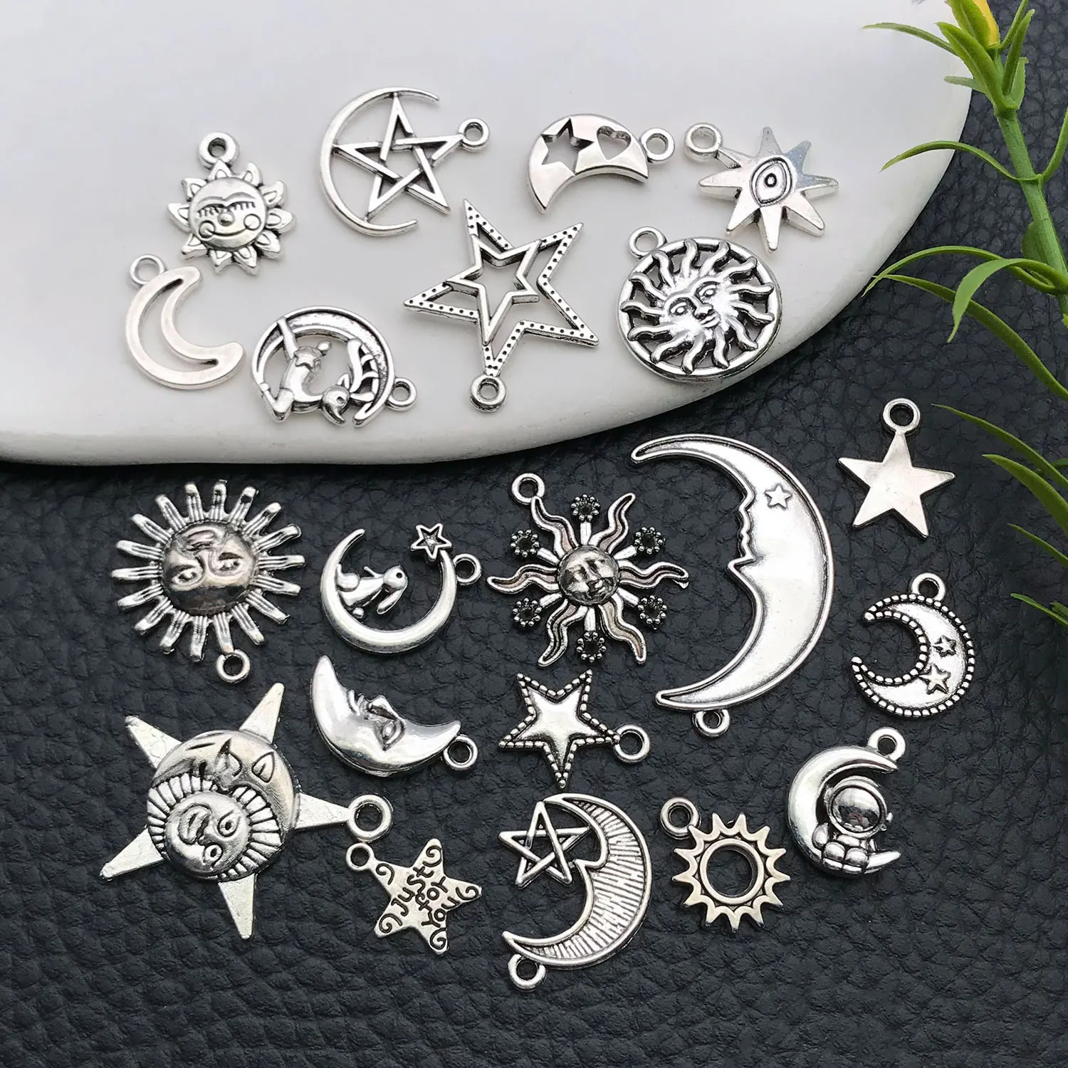 New Arrival: Assortment of 21 Star, Moon, and Five-Point Star Pendants - Vintage Alloy Charms for DIY Jewelry.