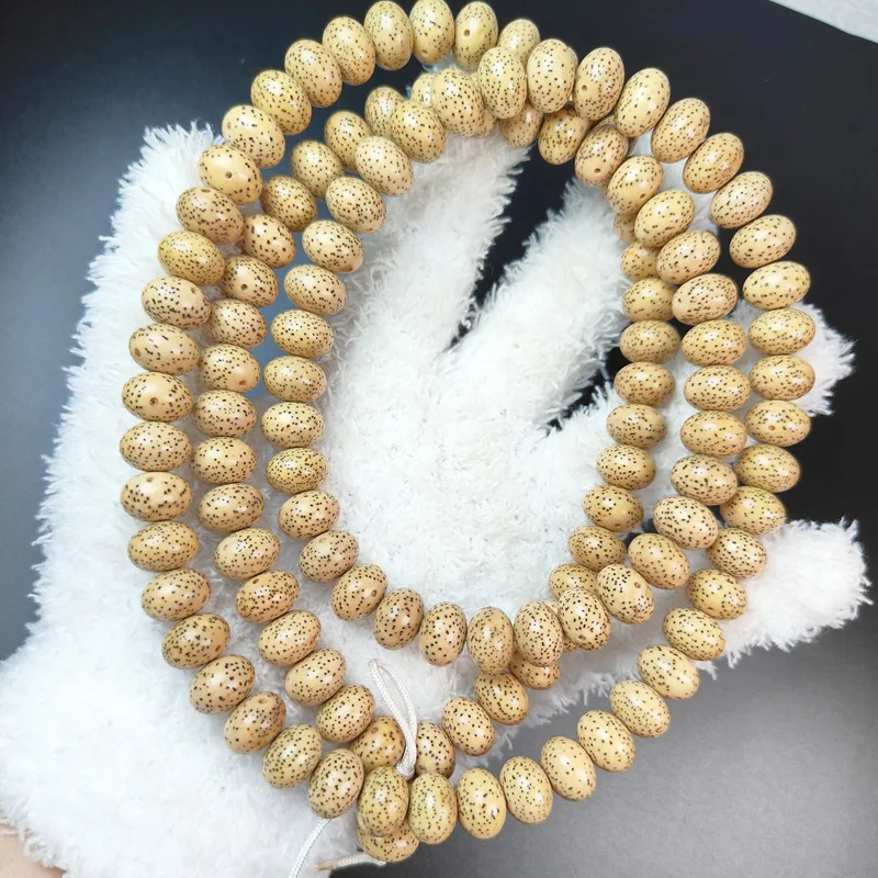

Golden Seed Moon Bodhi Hainan Xuan Yue High Density 12Mm-14Mm Buddhist Bead Bracelet