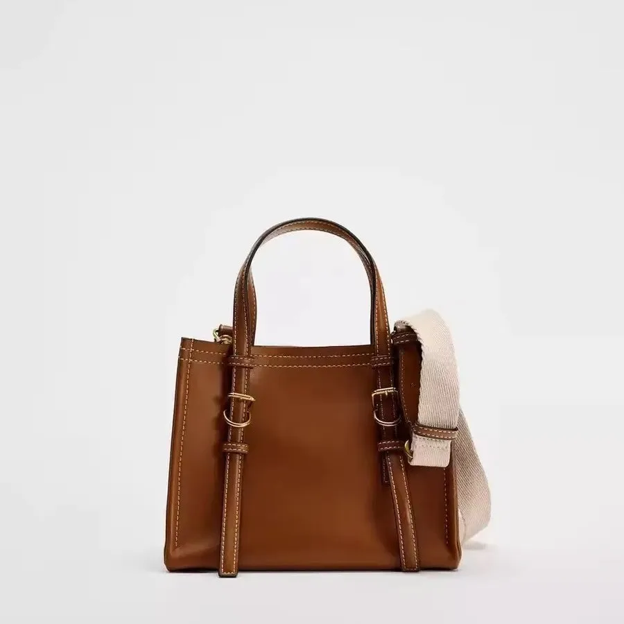 minimalist-unique-leisure-business-diaper-bag-for-women-stylish-vintage-fashionable-leather-tote-with-modern-silhouette